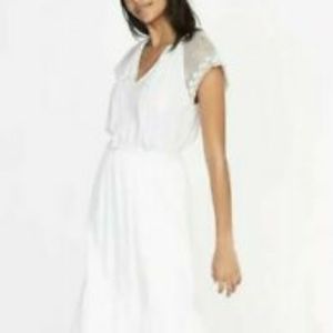 White ruffle dress with crochet sleeve